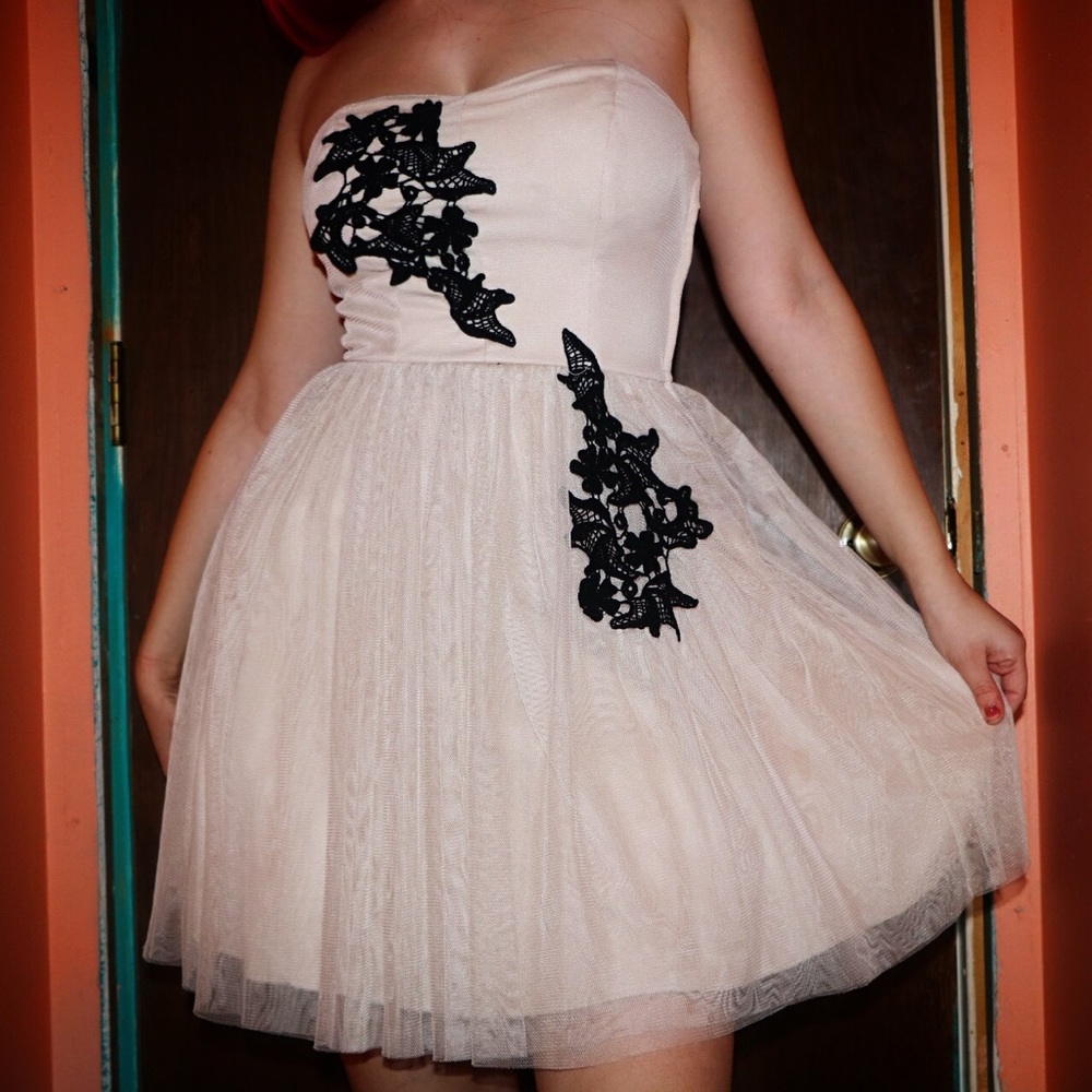 Strapless pink dress with black detailing